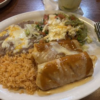 Cabana Tres Amigos - Chicken chimichangas I recommend getting the green sauce versus the red, but I forgot to order it that way - Mexican Near Me - Grand Rapids, Michigan Cabana Tres Amigos - Chicken chimichangas I recommend getting the green sauce versus the red, but I forgot to order it that way - Mexican Near Me - Grand Rapids, Michigan