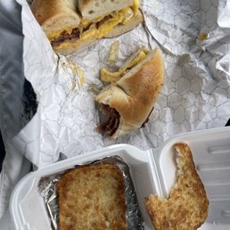 Half eastern turkey bacon egg and cheese with has browns Half eastern turkey bacon egg and cheese with has browns