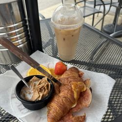 Pinks - Bacon, egg and cheese breakfast sandwich & oatmilk latte