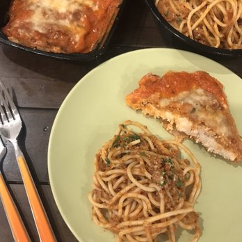 Pasta Talk - a plate of spaghetti and a slice of pizza - Italian Near Me - Irvine, California
