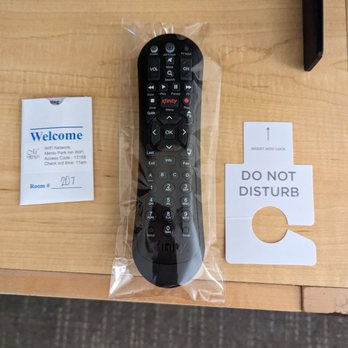 Menlo Park Inn - Sanitized remote control with lots of channels at Menlo Park Inn. - Hotels Near Me - Menlo Park, California