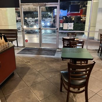 Wingstop - Someone spilled a drink literally at the front door but I guess no one will clean it up - Chicken Wings Near Me - Elk Grove, California