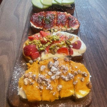 Postino Buckhead - Bruschetta Board. I only remember the last two shown, the one on the end was sweet potato, and next to it was the strawberry cheesecake! - Wine Bars Near Me - Atlanta, Georgia Postino Buckhead - Bruschetta Board. I only remember the last two shown, the one on the end was sweet potato, and next to it was the strawberry cheesecake! - Wine Bars Near Me - Atlanta, Georgia