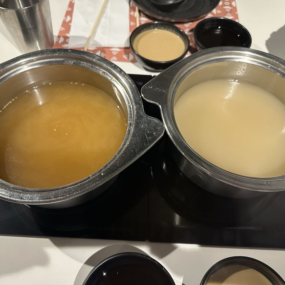 Nabemono Shabu Shabu - Left side: Miso broth Right side: Pork bone broth - Japanese Near Me - Alhambra, California Nabemono Shabu Shabu - Left side: Miso broth Right side: Pork bone broth - Japanese Near Me - Alhambra, California