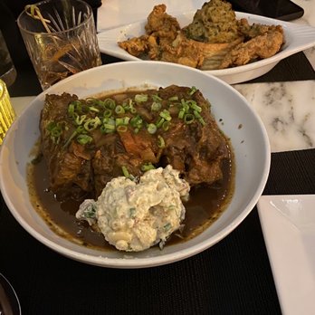 Saint John - Smothered Turkey Neck Appetizer - Cajun/Creole Near Me - New Orleans, Louisiana Saint John - Smothered Turkey Neck Appetizer - Cajun/Creole Near Me - New Orleans, Louisiana