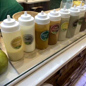 Mang Biche Mia - a variety of condiments on a counter - Specialty Food Near Me - Sunrise, Florida