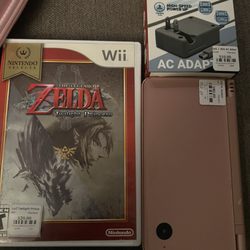Super Smash Video Games - used dsi xl + charger and twilight princess for wii