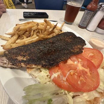 Soul Fish Cafe - Blackened redfish poboy with fries. It was the special of the day (Tuesday) - Seafood Near Me - Memphis, Tennessee Soul Fish Cafe - Blackened redfish poboy with fries. It was the special of the day (Tuesday) - Seafood Near Me - Memphis, Tennessee