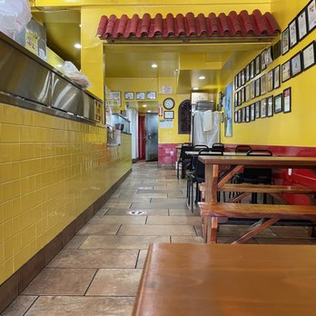 Taqueria Cancun - Inside is a cool tiled yellow - Mexican Near Me - San Francisco, California