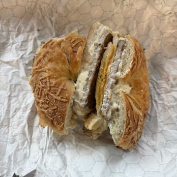 The Bagels and Co - Egg, Sausage, and Cheese, with Truffle Cream Cheese, on an Asiago Bagel - Coffee & Tea Near Me - Gainesville, Florida The Bagels and Co - Egg, Sausage, and Cheese, with Truffle Cream Cheese, on an Asiago Bagel - Coffee & Tea Near Me - Gainesville, Florida