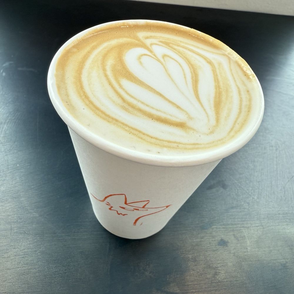 Den Mother latte with almond milk.