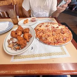 Jimmy's Pizza - Pizza with mozzarella sticks and buffalo wings