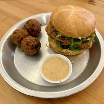 Dirty Lettuce - The Sweet Heat Treat special. Fried chicken sandwich with hot hunny, candied jalapeños, secret sauce and lettuce. Plus hush puppies. - Vegan Near Me - Portland, Oregon Dirty Lettuce - The Sweet Heat Treat special. Fried chicken sandwich with hot hunny, candied jalapeños, secret sauce and lettuce. Plus hush puppies. - Vegan Near Me - Portland, Oregon