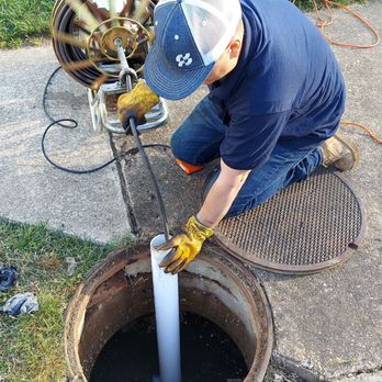 USA Drain Service - Man hole being drain cleaned outside apartment building. - Plumbing Near Me - Mechanicsville, Virginia USA Drain Service - Man hole being drain cleaned outside apartment building. - Plumbing Near Me - Mechanicsville, Virginia
