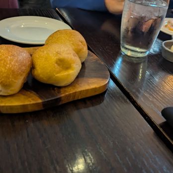 District - Rolls with butter / oil sampler dish - New American Near Me - Cleveland, Ohio District - Rolls with butter / oil sampler dish - New American Near Me - Cleveland, Ohio