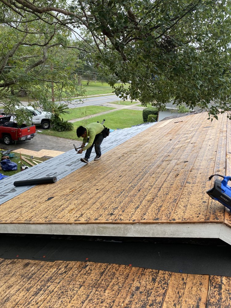 Slide of Swamp Roofing