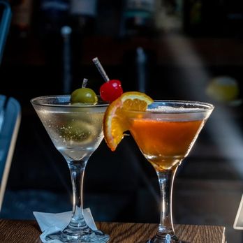 Ambassador Dining Room - Handcrafted cocktails including a classic martini and a citrus-forward signature drink, garnished with olives and fresh orang... - Indian Near Me - Baltimore, Maryland Ambassador Dining Room - Handcrafted cocktails including a classic martini and a citrus-forward signature drink, garnished with olives and fresh orang... - Indian Near Me - Baltimore, Maryland
