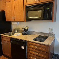 Candlewood Suites Mobile-Downtown - Microwave and area to cook basics.