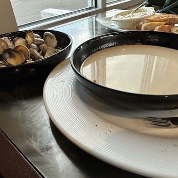 Amelia’s Hangar - Steamer clams in a broth you could happily live on it was so rich and delicious. - American Near Me - Bremerton, Washington Amelia’s Hangar - Steamer clams in a broth you could happily live on it was so rich and delicious. - American Near Me - Bremerton, Washington