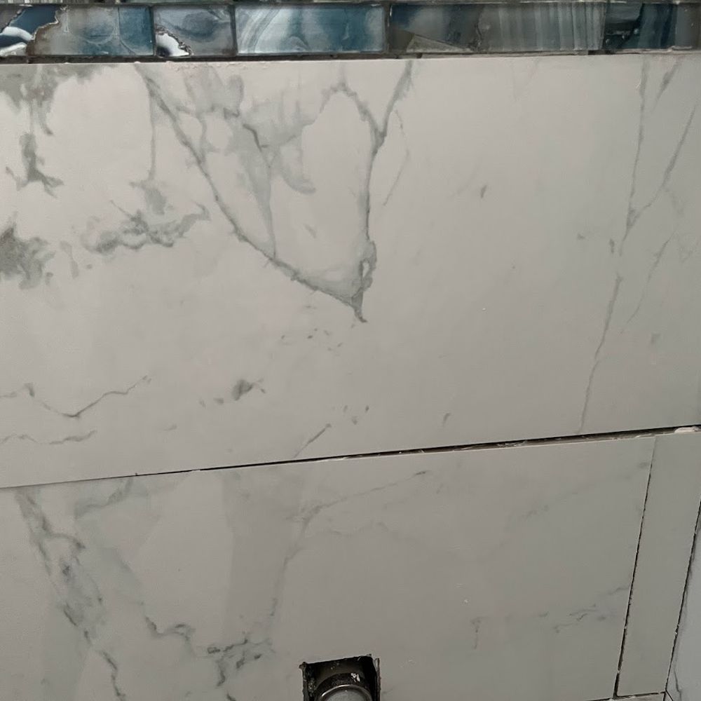 Honeycutt's Handyman Service - tile is falling down, wall is not level - Handyman Near Me