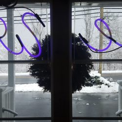 Goshen Wine And Spirits - front window after snow