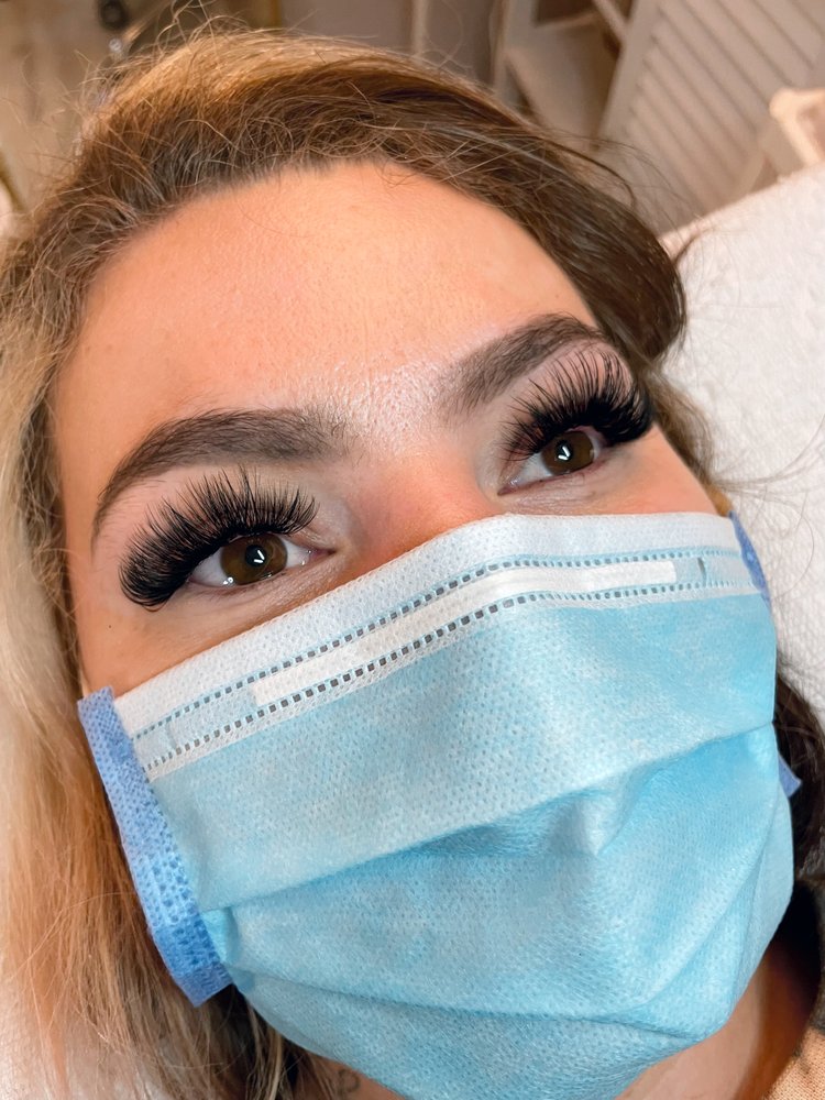 Luvly Esthetics and Permanent Makeup Logo