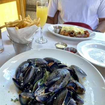 Parc - Moules and frites (front), cheese omelette (back) - French Near Me - Philadelphia, Pennsylvania Parc - Moules and frites (front), cheese omelette (back) - French Near Me - Philadelphia, Pennsylvania
