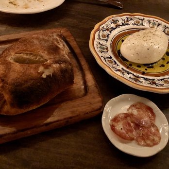 Ciccio Mio - House fennel bread with salami and pugliese burrata - Italian Near Me - Chicago, Illinois Ciccio Mio - House fennel bread with salami and pugliese burrata - Italian Near Me - Chicago, Illinois