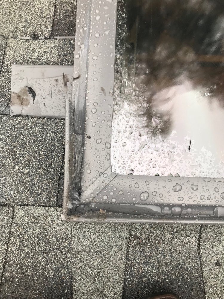 Slide of Mackel Roofing Company