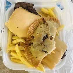 Abuela’s Kitchen Latin American - Only onions and dot of mayo. Saddest pan con bistec ever.