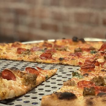 Wooster's Pizzeria - a slice of pizza - Pizza Near Me - Moscow, Idaho