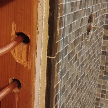 Repipe & Water Heaters 4 Less - Repiping from the side of a shower like a surgeon. - Plumbing Near Me Repipe & Water Heaters 4 Less - Repiping from the side of a shower like a surgeon. - Plumbing Near Me