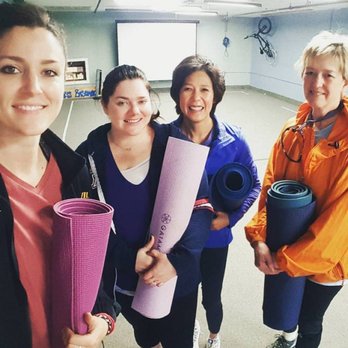 Tracee Byrd - With members of the community at a local pilates class. - Trainers Near Me Tracee Byrd - With members of the community at a local pilates class. - Trainers Near Me