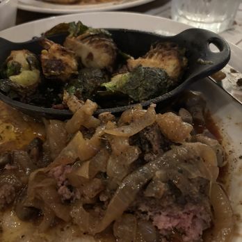 Saltgrass Steak House - The chopsticks with caramelized, onions, and mushrooms on top, which is serve like this not extra. Also, I had Side for brussels sprouts. - Steakhouses Near Me - Grapevine, Texas
