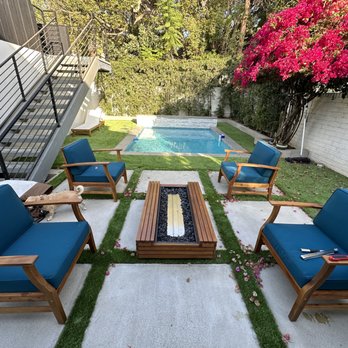 Aldan Construction & Remodeling - a patio with a pool in the background - General Contractors Near Me - Beverly Hills, California