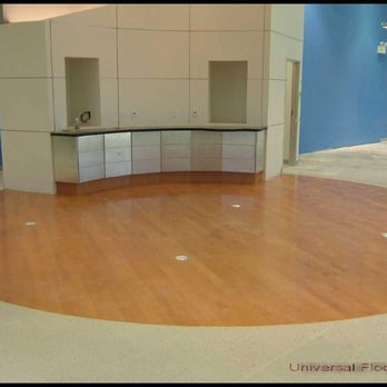 Universal Flooring - an empty room with a counter and cabinets - Flooring Near Me - Citrus Heights, California Universal Flooring - an empty room with a counter and cabinets - Flooring Near Me - Citrus Heights, California
