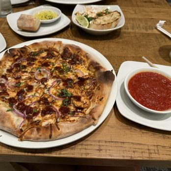 California Pizza Kitchen - The Original BBQ Chicken Pizza with a side of cold marinara - Pizza Near Me - Aiea, Hawaii