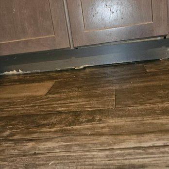 Empire Today - cabinet damage. these cabinets are only 2 yrs old. - Carpet Installation Near Me