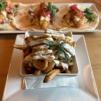 Cilantro and Chive - Dill pickle poutine - Steakhouses Near Me - Lacombe, Alberta