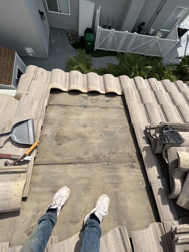 Slide of Ronald Merchant Roofing