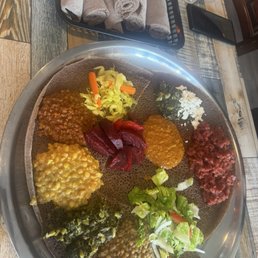 Vegan special and special kitfo on the same platter Vegan special and special kitfo on the same platter
