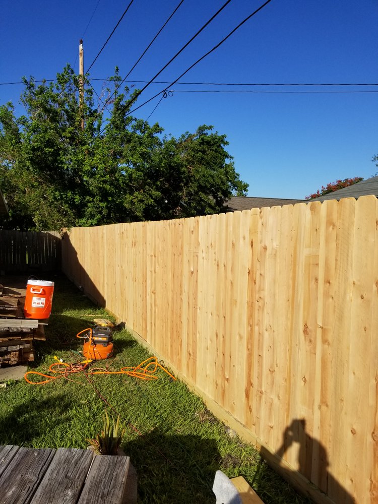 Slide of Vela's Roofing and Construction