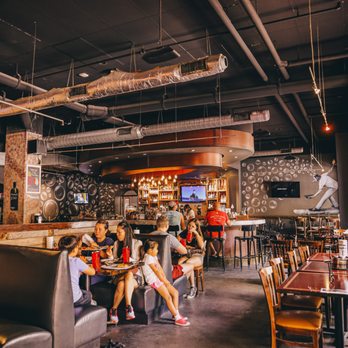 V Pizza + Sidecar - people sitting in a restaurant - Pizza Near Me - Gainesville, Florida
