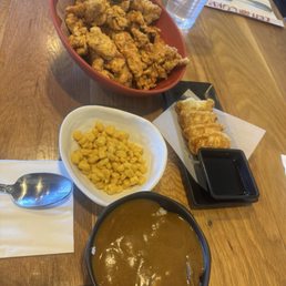 Mini curry bowl, gyoza, side of corn and karaage chicken crunchy Mini curry bowl, gyoza, side of corn and karaage chicken crunchy
