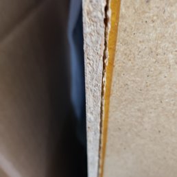 a close up of the edge of the cabinet a close up of the edge of the cabinet