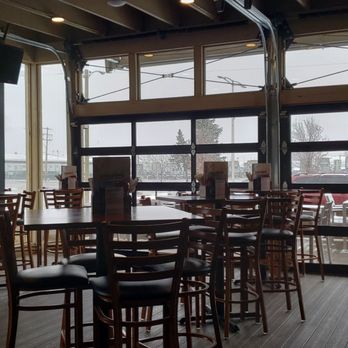 Who’s on Layton | A Cream City Concepts Destination - a woman standing at a bar - Sports Bars Near Me - Milwaukee, Wisconsin Who’s on Layton | A Cream City Concepts Destination - a woman standing at a bar - Sports Bars Near Me - Milwaukee, Wisconsin