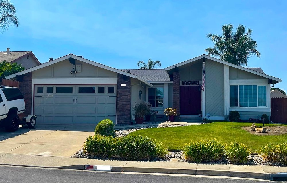 Slide of V Mendoza Roofing