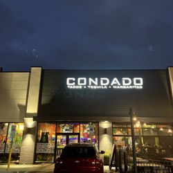 Condado Tacos - Front of the building with a partial view of the patio