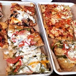 Three slices of three varieties cut in thirds for sharing in a group.