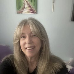 Sally Beauty - My bedroom & my daughter painted the picture behind me. The crucifix used to be my Mother's, RIP.